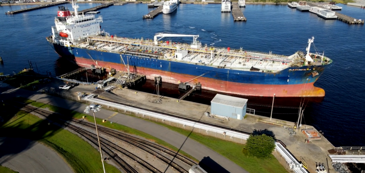 An aerial view of a docked large cargo ship