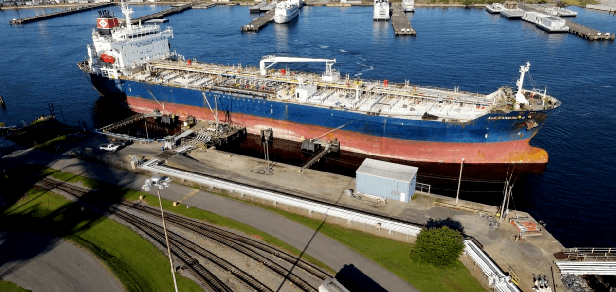 An aerial view of a docked large cargo ship